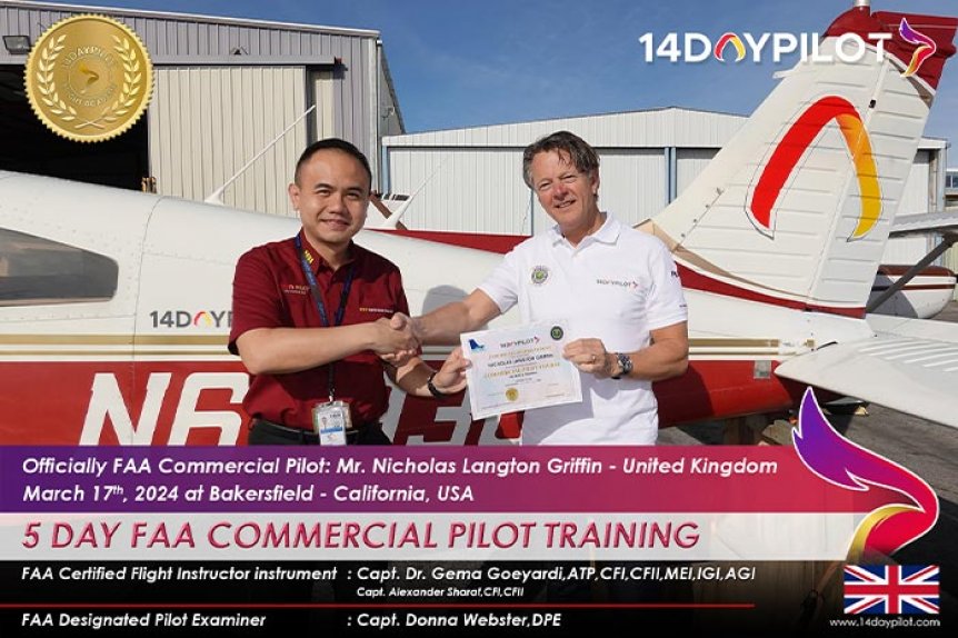 Nicholas Griffin proudly holding his Commercial Pilot License (CPL) certificate after completing accelerated training at 14DA